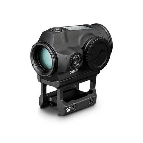 Black tactical sight with visible branding on a white background