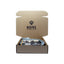 Open cardboard box with KORE Essentials branding on a white background